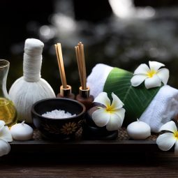 Spa beauty massage health wellness background.  Spa Thai therapy treatment aromatherapy for body woman with flower nature candle for relax and summer time, top view.  Lifestyle and cosmetic Concept